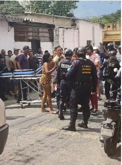 Investigan muerte de un sujeto baleado tras hecho entre vecinos en San Joaquín